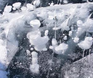 The Reason for the Unusual Shapes of the Frozen Water in Lake Baikal